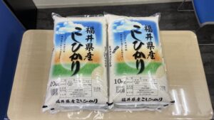 企業から精米を提供いただきました